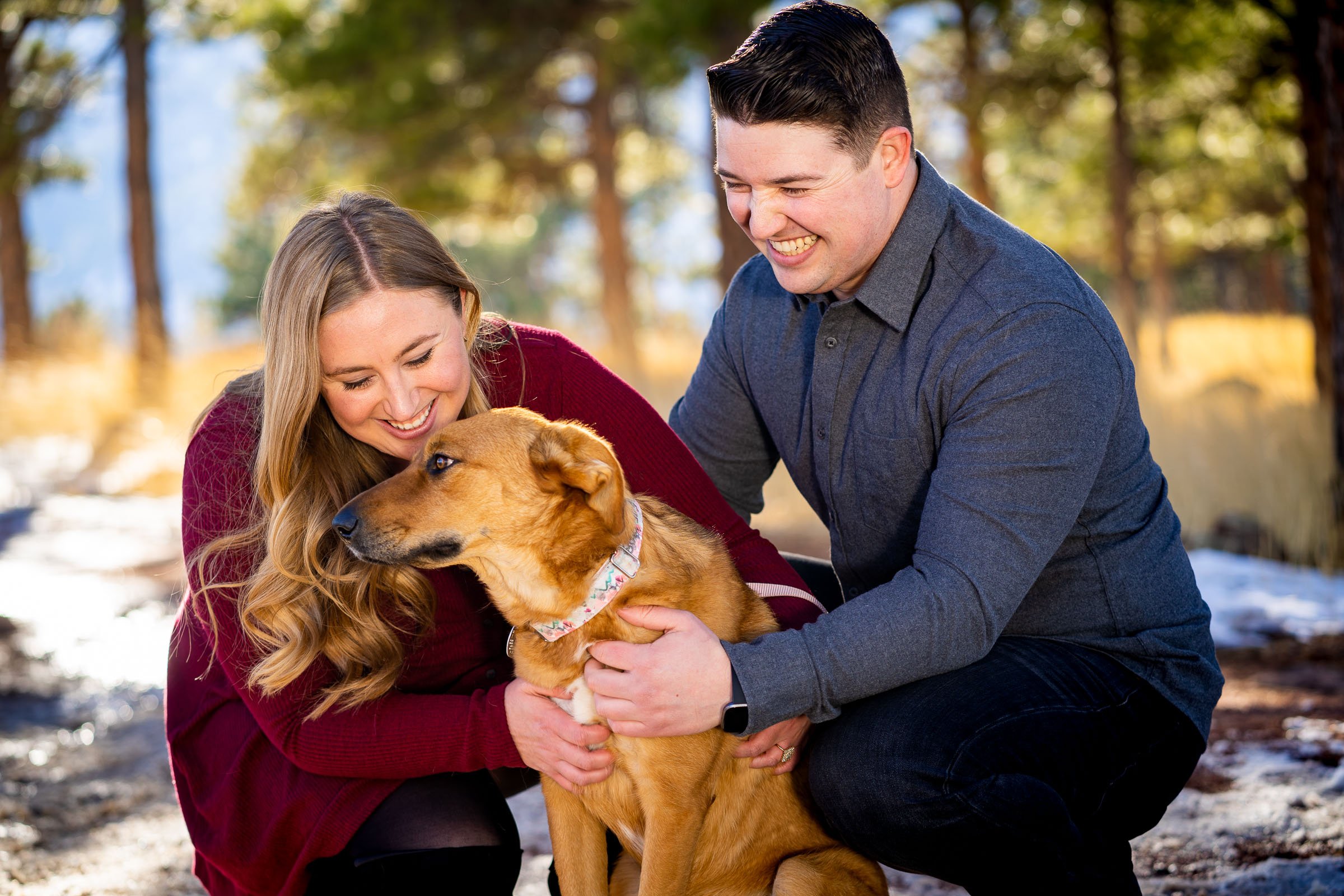 Engaged couple kisses their dog golden hour with mountains in the background, Mountain Engagement Photos, Engagement Session, Engagement Photos, Engagement Photos Inspiration, Engagement Photography, Engagement Photographer, Engagement Portraits, Winter Engagement Photos, Snow Engagement Photos, Boulder engagement session, Boulder engagement photos, Boulder engagement photography, Boulder engagement photographer, Boulder engagement inspiration, NCAR Trail engagement session, NCAR Trail engagement photos, NCAR Trail engagement photography, NCAR Trail engagement photographer, NCAR Trail engagement inspiration, Colorado engagement session, Colorado engagement photos, Colorado engagement photography, Colorado engagement photographer, Colorado engagement inspiration