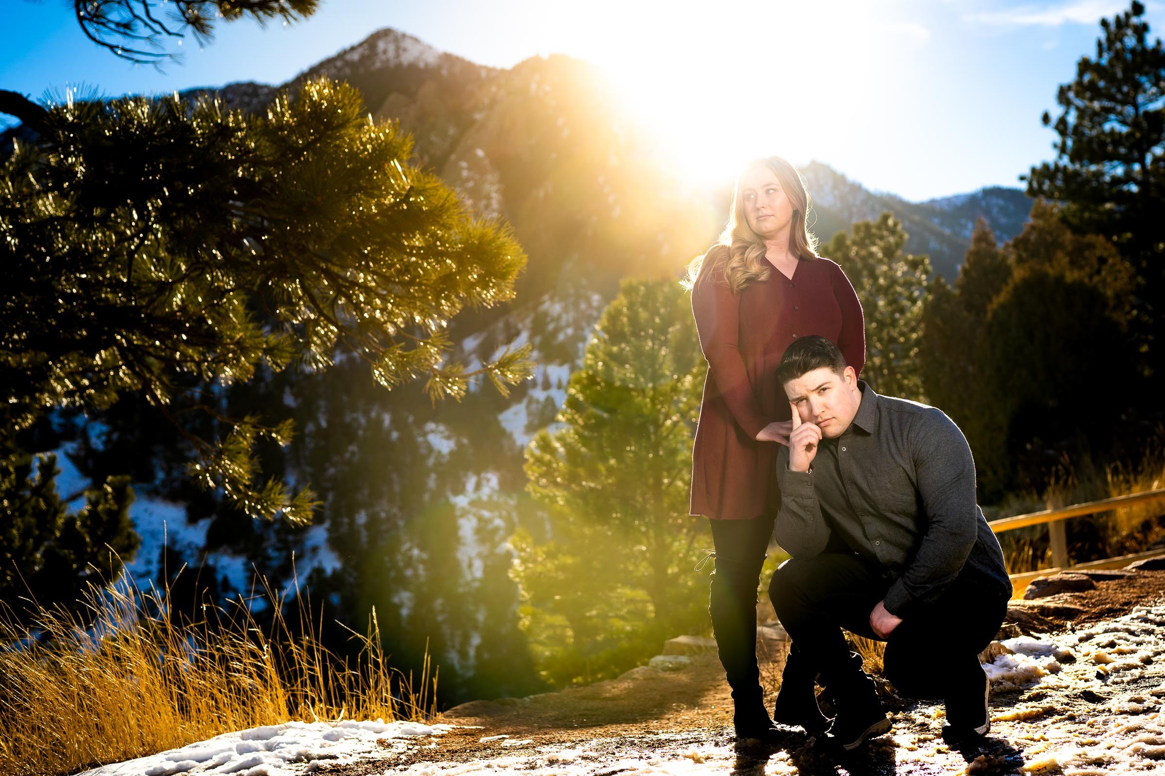 Engaged couple poses for portraits with the flatirons mountains in the background, Mountain Engagement Photos, Engagement Session, Engagement Photos, Engagement Photos Inspiration, Engagement Photography, Engagement Photographer, Engagement Portraits, Winter Engagement Photos, Snow Engagement Photos, Boulder engagement session, Boulder engagement photos, Boulder engagement photography, Boulder engagement photographer, Boulder engagement inspiration, NCAR Trail engagement session, NCAR Trail engagement photos, NCAR Trail engagement photography, NCAR Trail engagement photographer, NCAR Trail engagement inspiration, Colorado engagement session, Colorado engagement photos, Colorado engagement photography, Colorado engagement photographer, Colorado engagement inspiration, Flatiron Engagement Photos, Chautauqua Engagement Photos