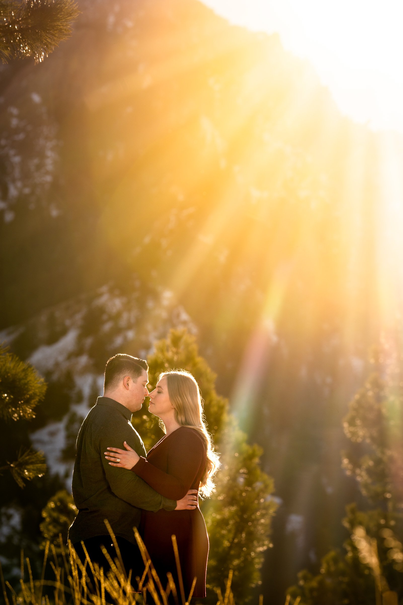 Engaged couple poses for portraits with the flatiron mountains in the background, Mountain Engagement Photos, Engagement Session, Engagement Photos, Engagement Photos Inspiration, Engagement Photography, Engagement Photographer, Engagement Portraits, Winter Engagement Photos, Snow Engagement Photos, Boulder engagement session, Boulder engagement photos, Boulder engagement photography, Boulder engagement photographer, Boulder engagement inspiration, NCAR Trail engagement session, NCAR Trail engagement photos, NCAR Trail engagement photography, NCAR Trail engagement photographer, NCAR Trail engagement inspiration, Colorado engagement session, Colorado engagement photos, Colorado engagement photography, Colorado engagement photographer, Colorado engagement inspiration, Flatiron Engagement Photos, Chautauqua Engagement Photos