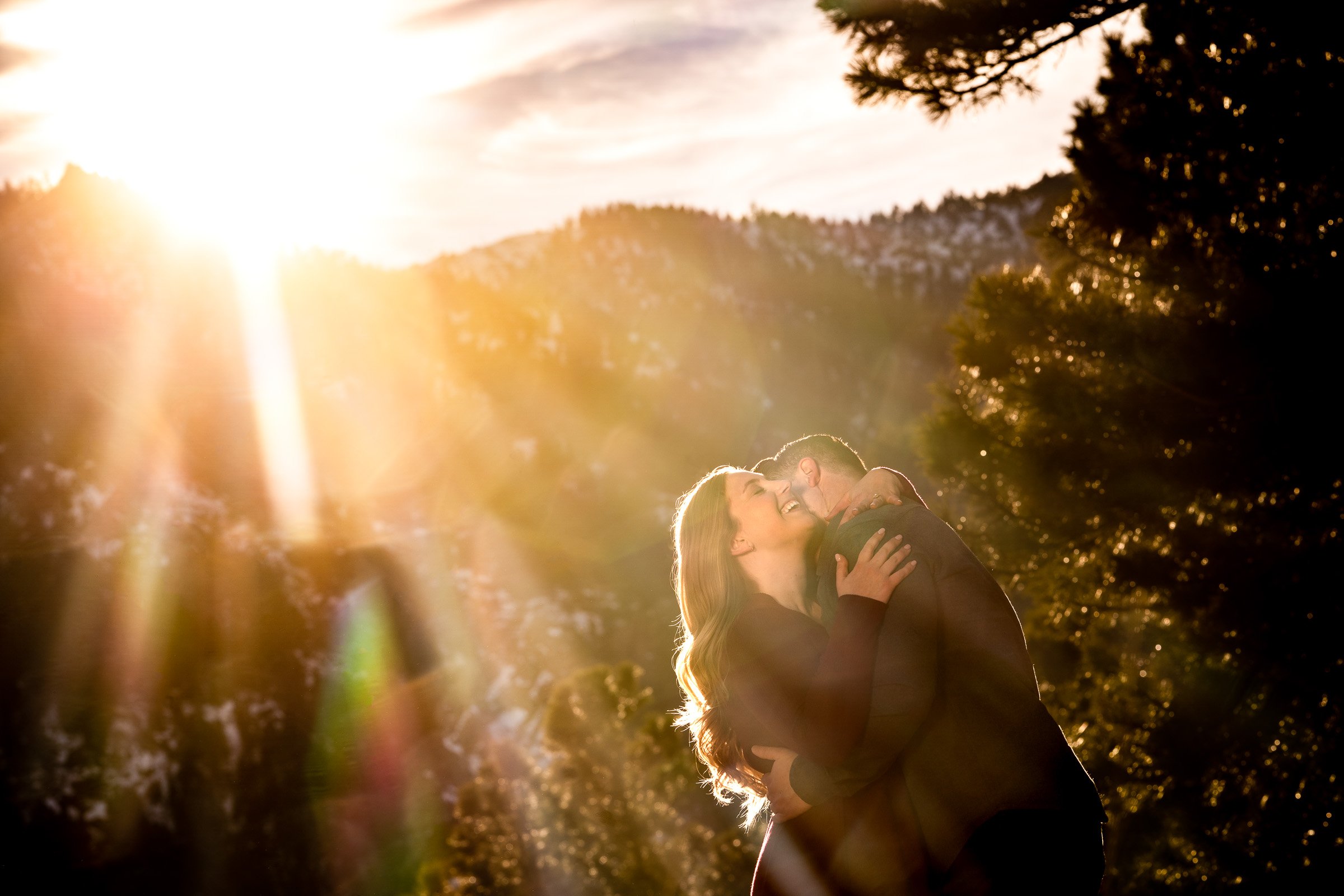 Engaged couple poses for portraits with the flatiron mountains in the background, Mountain Engagement Photos, Engagement Session, Engagement Photos, Engagement Photos Inspiration, Engagement Photography, Engagement Photographer, Engagement Portraits, Winter Engagement Photos, Snow Engagement Photos, Boulder engagement session, Boulder engagement photos, Boulder engagement photography, Boulder engagement photographer, Boulder engagement inspiration, NCAR Trail engagement session, NCAR Trail engagement photos, NCAR Trail engagement photography, NCAR Trail engagement photographer, NCAR Trail engagement inspiration, Colorado engagement session, Colorado engagement photos, Colorado engagement photography, Colorado engagement photographer, Colorado engagement inspiration, Flatiron Engagement Photos, Chautauqua Engagement Photos